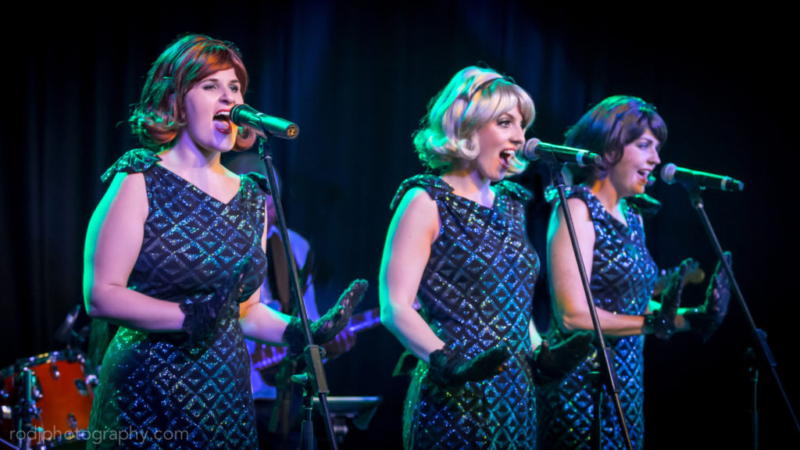 The girls in diamond pattern dresses